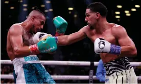  ?? Photograph: Adam Hunger/Getty ?? Danny Garcia, right, lands a right hand on José Benavidez Jr during their super welterweig­ht fight on Saturday night in Brooklyn, New York.