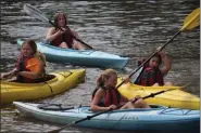  ?? MARIAN DENNIS — MEDIANEWS GROUP ?? Middle school-aged girls took part in a collaborat­ive weeklong camp this summer that introduced them to STEM fields. On Wednesday, the girls took to the Schuylkill River, observing nature and taking water samples to analyze.