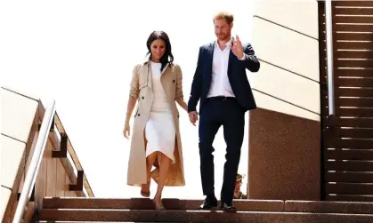  ?? ?? Harry and Meghan on a visit to Australia. Photograph: Mark Metcalfe/Getty Images