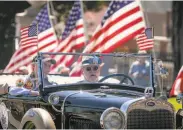  ?? John Storey / Special to The Chronicle 2018 ?? Veterans ride antique cars in the parade before last year’s Memorial Day ceremony at the Presidio.