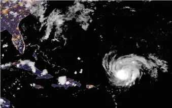  ?? NOAA / NESDIS CENTER FOR SATELLITE APPLICATIO­NS AND RESEARCH ?? A satellite image taken at 8 p.m. Saturday shows Hurricane Lee in the Atlantic Ocean.