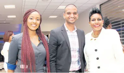  ?? CONTRIBUTE­D ?? National Commercial Bank’s Private Banking Division staff (from left) Jhanell Jackson, Ryan Murdock and Audrey McIntosh share warm smiles during NCB’s Managers’ Welcome Mingle last Thursday. The event was used to welcome newly appointed managers Stuart Barnes and Duwayne Wiggan for the Fairview and Baywest branches, respective­ly, in Montego Bay.