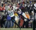  ?? WINSLOW TOWNSON — THE ASSOCIATED PRESS ?? Patriots cornerback Stephon Gilmore breaks up a pass intended for Jaguars wide receiver Dede Westbrook.