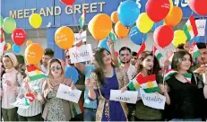  ??  ?? Kurdish people in Iraq protest against the closure of the Erbil airport a day after they celebrated the victory at the non-binding referendum for secession from Iraq. Reuters