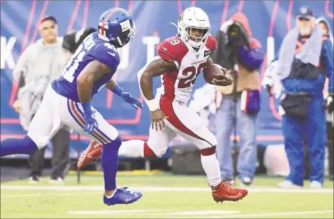  ?? Emilee Chinn / Getty Images ?? The Giants’ Antoine Bethea, left, tries to track down the Cardinals’ Chase Edmonds on a touchdown run in the third quarter on Sunday.