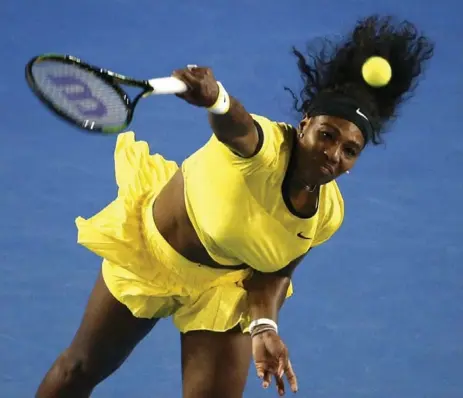  ?? JASON REED/REUTERS ?? Serena Williams serves during her semifinal against Agnieszka Radwanska at the Aussie Open Thursday. Williams made the final with a 6-0, 6-4 win.