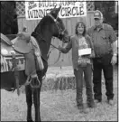  ??  ?? Cindi Slimp of Columbia, Mo., and her mule, Pecos Bill, won the senior Negel Hall Memorial Award at the 25th annual Pea Ridge Mule Jump Saturday.