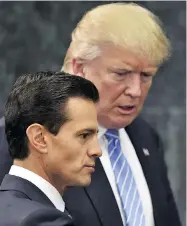  ?? YURI CORTEZ / AFP / GETTY IMAGES FILES ?? The White House aims to have the new trade deal signed by Mexican President Enrique Pena Nieto, left, before his recently elected successor takes office on Dec. 1.