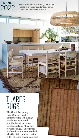  ?? ?? In this Montauk, N.Y., dining space, the Tuareg rug, wicker pendant and safari chairs keep the vibe summery.
Vintage Tuareg rugs, from $9,725 each. Elte.