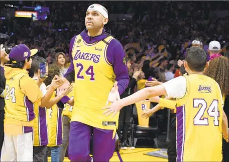  ?? Kelvin Kuo Associated Press ?? JARED DUDLEY (wearing Kobe Bryant’s No. 24 jersey) says he is “almost 100% sure” that all playoff series will be best-of-seven games.