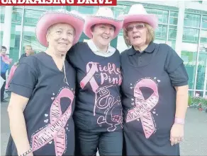  ??  ?? Tickled Pink supporters Loose Boots line dancers