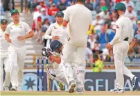  ?? — Reuters ?? England’s James Anderson reacts after being hit in the helmet in the third Test in Perth.
