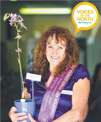  ?? FLOWERING TALENT: Ruth Whiting with her champion orchid. Picture: ZAK SIMMONDS ??