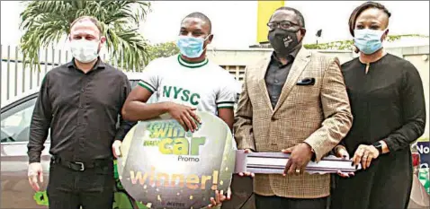  ??  ?? Senior Banking Advisor, Retail, Access Bank, Robert Giles ( left); winner of Transact And Win Promo, Tolulope Agbaje; Executive Director, Retail Banking, Access Bank, Victor Etuokwu; and Group Head, Retail Marketing and Analytics, Chioma Afe during the presentati­on of car prize to winner of the Transact and Win Promo, in Lagos. PHOTO: FEMI ADEBESIN- KUTI