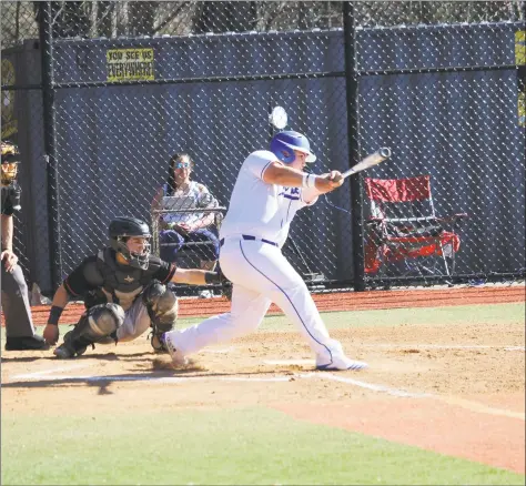  ?? Anthony E. Parelli / Hearst Connecticu­t Media ?? Darien’s Sean O’Malley connects on a double in the first inning during a game against Stamford earlier this season.