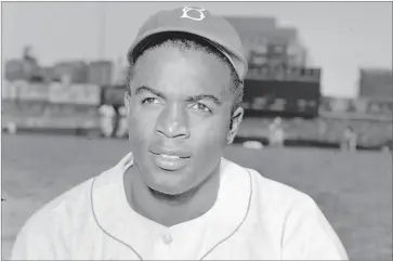  ?? AP FILE PHOTO ?? This is an April 18, 1948, portrait of Brooklyn Dodgers baseball player Jackie Robinson. It’s Jackie Robinson Day across the big leagues on Friday, Aug. 28, as baseball honors the man who broke the sport’s color barrier in 1947.