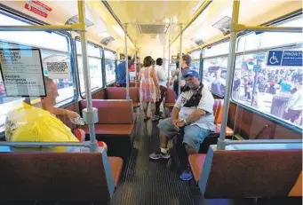  ?? NELVIN C. CEPEDA U-T PHOTOS ?? Metropolit­an Transit System brought its first trolley car to the E Street Station in Chula Vista on Saturday so members of the public could check it out. About 1,000 people came to the 40-year celebratio­n.