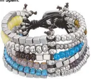  ??  ?? Malabarism­os (Juggling Balls) bracelet with silver- plated beads, earth tone crystals and brown leather