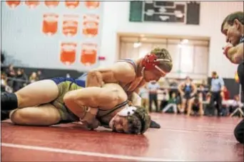  ?? DIGITAL FIRST MEDIA FILE ?? Owen J. Roberts’ Nick Duliakas tries to turn Sun Valley’s Hunter Catka a 195-pound bout between the two. in this file photo of