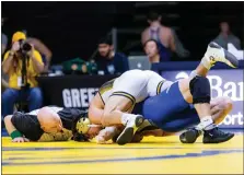  ?? JAM DAVID — UNC ATHLETICS ?? University of Northern Colorado graduate student Andrew Berreyesa pins Air Force’s Gage Musser in the Bears’ senior day wrestling match on Sunday, Feb. 19, 2022. UNC defeated the Falcons, 37-9, after four wrestlers recorded pins.