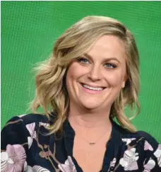  ?? RICHARD SHOTWELL/INVISION/THE ASSOCIATED PRESS ?? Amy Poehler plays optimistic bureaucrat Leslie Knope on Parks and Rec, arguably the funniest mid-level bureaucrat in history, Judith Timson writes.