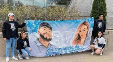  ?? Pat Tomlinson/Hearst Connecticu­t Media ?? Family members of Yuliana Arias Lozano, one of two people killed in a hit-and-run crash in Stamford in December, held a banner in front of the Connecticu­t Superior Court in Stamford on Tuesday.