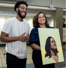  ?? ?? Artist Korey Edmonson with portrait subject Kandace Adams.
Tameka Adams with her great nephew, L. Marchman, daughter Avery Akins and mother, Donna Adams.