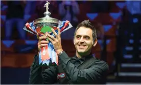  ??  ?? Ronnie O’Sullivan celebrates winning his sixth world title at the Crucible in Sheffield on Sunday. Photograph: Benjamin Mole/WST/Rex/Shuttersto­ck