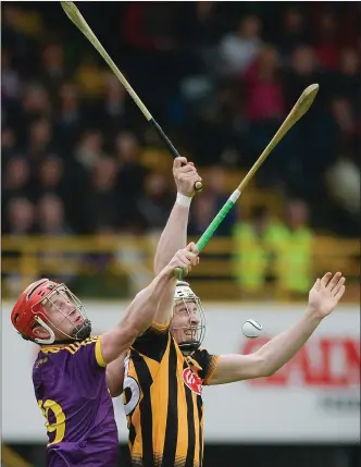  ??  ?? Corner-back Willie Devereux battling with Kilkenny’s Liam Blanchfiel­d during the semi-final victory.