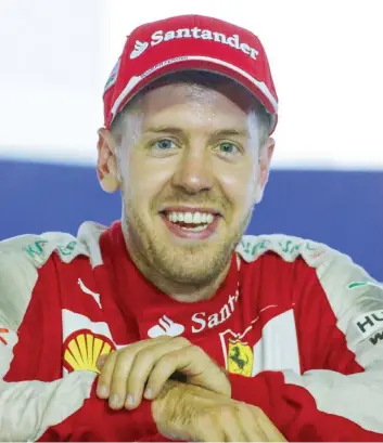  ?? ANSA ?? Il ferrarista Sebastian Vettel, 28 anni, si è iscritto ufficialme­nte al partito dei sostenitor­i di Valentino Rossi