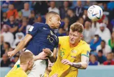  ?? ?? France’s Kylian Mbappe scores their third goal against Australia in the FIFA World Cup Qatar 2022 Group D match at the Al Janoub Stadium yesterday. (Reuters)