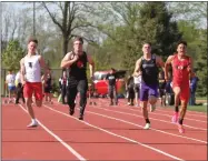  ?? RANDY MEYERS — FOR THE MORNING JOURNAL ?? Runners compete in the boys 100-meter dash at the LC8 meet on May 11.