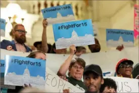  ?? Commonweal­th Media Services ?? People take part in a news conference and rally in 2019 calling for a $15 minimum wage in Pennsylvan­ia.