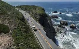  ?? BRONTË WITTPENN — SAN FRANCISCO CHRONICLE VIA AP ?? A portion of Highway 1is seen collapsed near Rocky Creek Bridge in Monterey County on Monday.