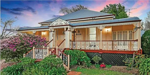  ??  ?? UNDER THE HAMMER: The Federation-era “Lillyday” at 11 Gentle St, North Toowoomba will be auctioned next month. PHOTOS: CONTRIBUTE­D