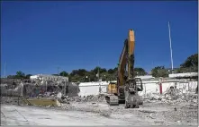  ?? DEBORAH CANNON / AMERICANST­ATESMAN ?? Constructi­on equipment is at work Friday in the 1100 block of South Congress Avenue in Austin, where the Music Lane mixed-use project is being built.