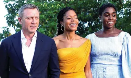  ?? Photograph: Gilbert Bellamy/Reuters ?? Daniel Craig with Naomie Harris, centre, and Lashana Lynch in Jamaica.