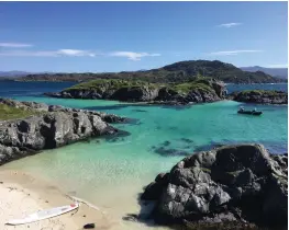  ??  ?? Pictured left: The view from, Shoe Bay, Eilean Shona's own secluded beach, with its silver sand lapped by an aquamarine sea - South Shore is the islands closest cottage to it.