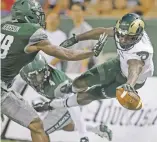  ?? MARCO GARCIA/AP FILE PHOTO ?? Colorado State wide receiver Michael Gallup, right, scores Sept. 30 against Hawaii in Honolulu. Colorado State and Marshall are meeting in the New Mexico Bowl.