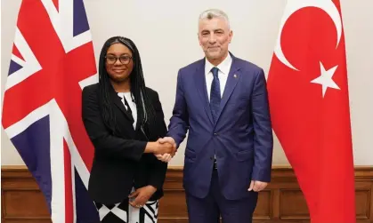  ?? Photograph: Jordan Pettitt/PA ?? Britain’s business secretary, Kemi Badenoch, greets Turkey’s trade minister, Ömer Bolat, at the start of talks in London on an upgraded free trade agreement.