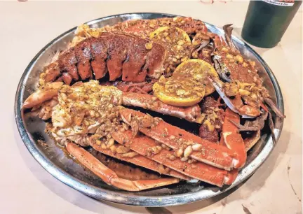  ?? RED HOOK CAJUN SEAFOOD & BAR ?? A boiled seafood platter at Red Hook Cajun Seafood & Bar.