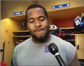  ?? TOM CANAVAN — THE ASSOCIATED PRESS ?? Giants rookie defensive lineman B.J. Hill talks to the media after practice Thursday in East Rutherford.