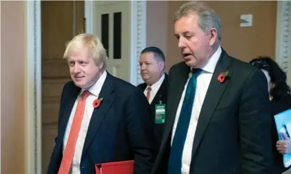  ??  ?? Boris Johnson, then foreign secretary, with the UK ambassador to the US, Sir Kim Darroch, in 2017. Photograph: Michael Reynolds/EPA