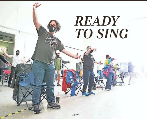  ?? MADDIE SCHROEDER PHOTOS/FOR THE DISPATCH ?? Members of the Columbus Gay Men’s Chorus rehearse dance moves to 1993 hit “What’s Up” by 4 Non Blondes in preparatio­n for their first performanc­e of the season from a warehouse off of North Hamilton Road in Columbus on April 18.