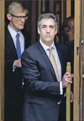  ?? Jason Szenes EPA/Shuttersto­ck ?? MICHAEL COHEN, President Trump’s former personal lawyer, pleaded guilty to eight charges of felony fraud and campaign finance law violations in New York.