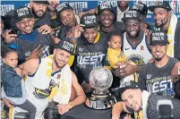  ?? DAVID J. PHILLIP THE ASSOCIATED PRESS ?? The Golden State Warriors were named Sports Illustrate­d’s Sportspers­on of the Year after repeating as champions.