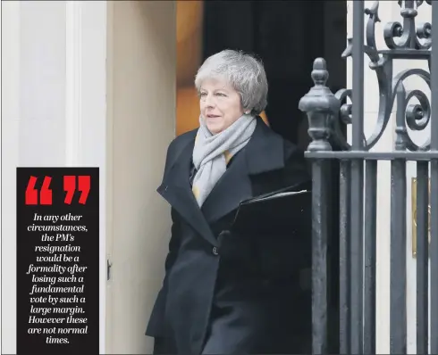  ?? PICTURE: DANIEL LEAL-OLIVAS/AFP/GETTY IMAGES. ?? IN OFFICE BUT NOT IN POWER: Theresa May leaves Downing Street ahead of the vote on her agreement with the European Union.