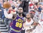  ?? FRANK GUNN THE CANADIAN PRESS ?? Jae Crowder led Utah with 30 points, a season high for the Jazz forward. Pascal Siakam, right, had 28.