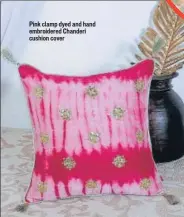  ??  ?? Pink clamp dyed and hand embroidere­d Chanderi cushion cover