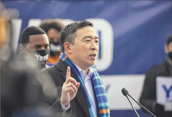  ?? Kevin Hagen / Associated Press ?? Andrew Yang announces his run for New York mayor during a news conference in New York’s Morningsid­e Park on Thursday.
